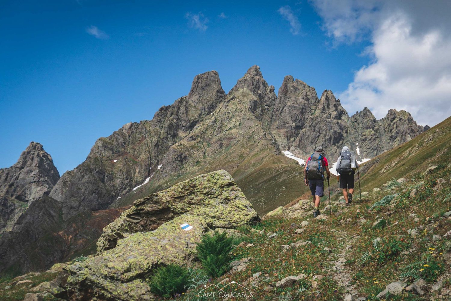 Georgia trekker ascending Tobavarchkhili's high summit ridge