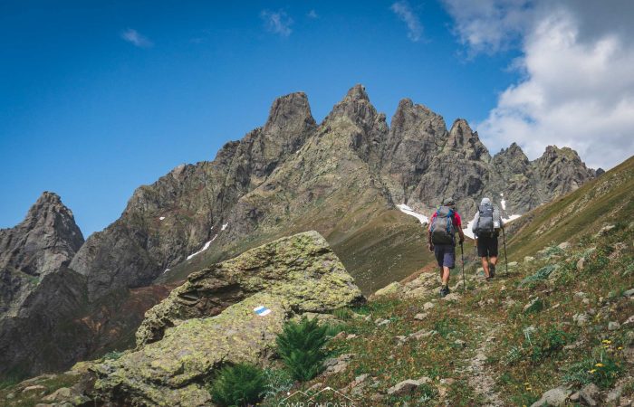 Georgia trekker ascending Tobavarchkhili's high summit ridge
