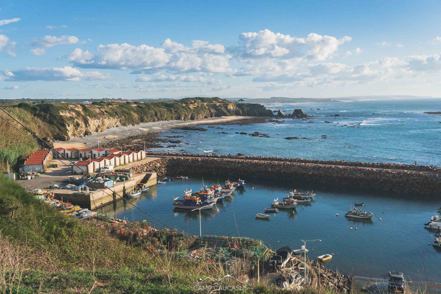 Small fishing boats in the harbor of Azenha do Mar on the Fisherman’s Trail.