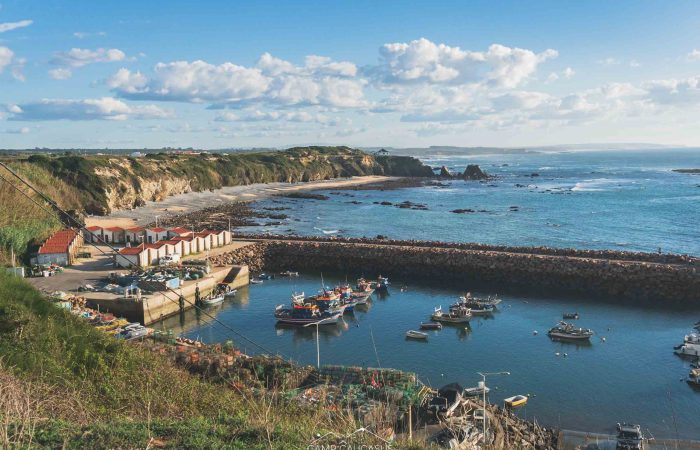 Small fishing boats in the harbor of Azenha do Mar on the Fisherman’s Trail.