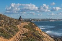 portugal-coastal-hike-fishermans-trail-porto-covo-villa-nova-milfontes Hikers on the Fisherman’s Trail along the Rota Vicentina coast.