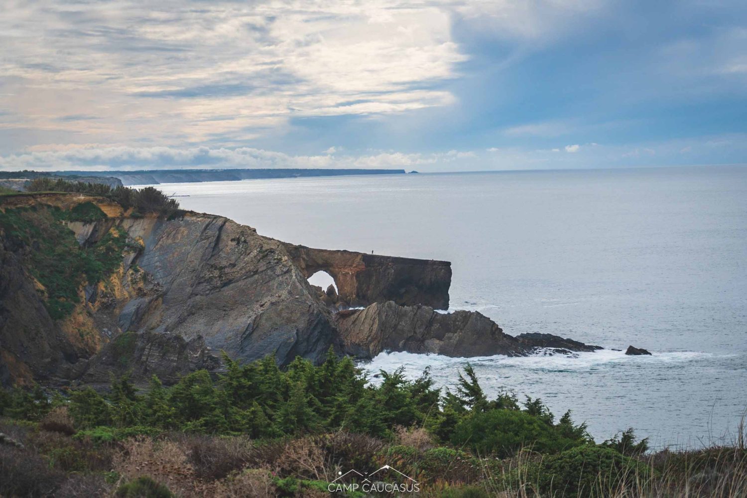 Hikers walking along cliffs on the Fisherman’s Trail from Zambujeira do Mar to Odeceixe.